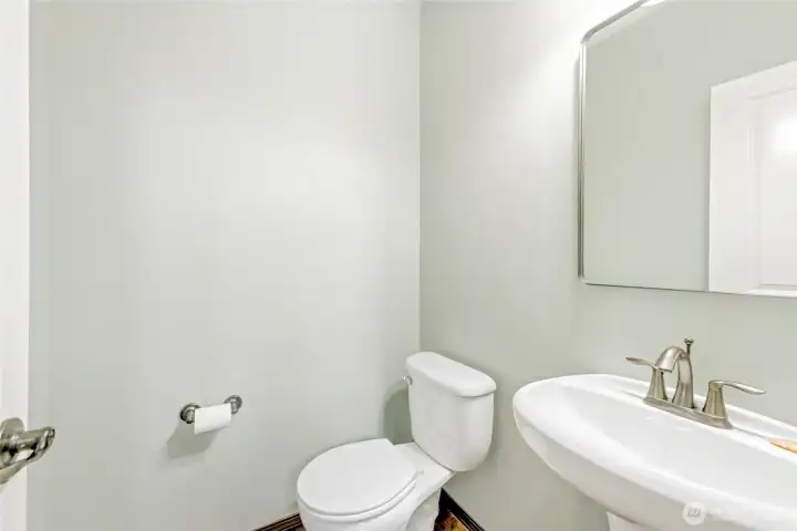 Convenient downstairs half bathroom.