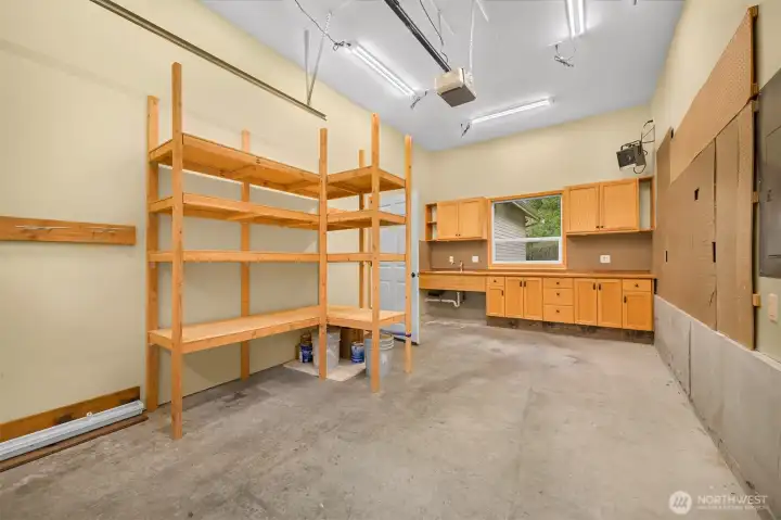 3rd car garage with sink and workshop area