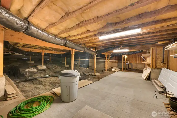 Extra storage and workshop area under the house.