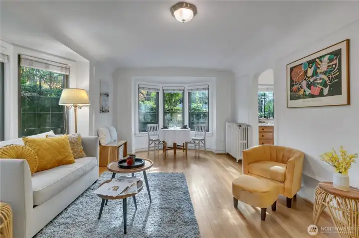 Natural light, charm, and character abound in this sweet Cherry Hill/Squire Park home.