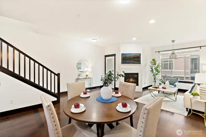 Dining area positioned between living room and kitchen for effortless entertaining.