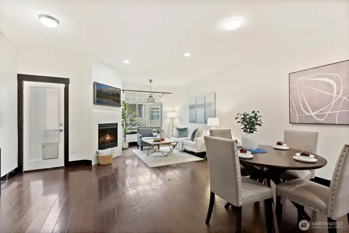 Spacious dining area with contemporary lighting and flexible seating layout.