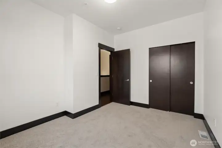 Additional bedroom with flexible layout and clean design.