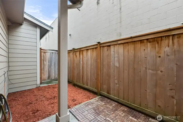 Alternate patio view highlighting low-maintenance outdoor living.