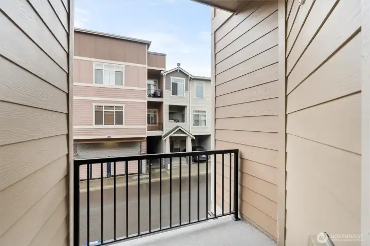 Private balcony overlooking the community—perfect for morning coffee.