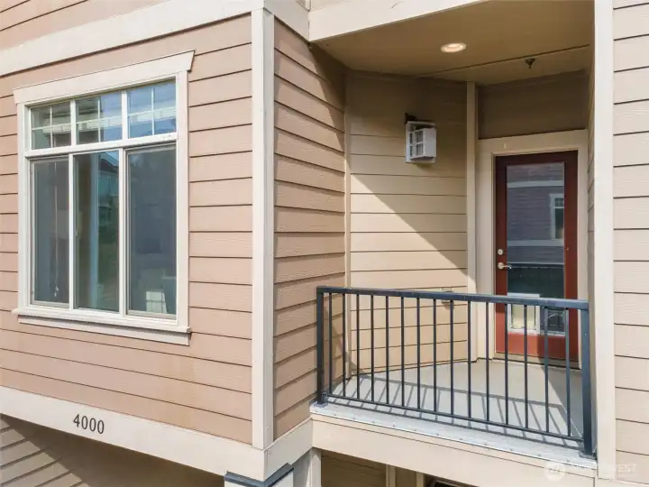 Covered exterior balcony with contemporary detailing.