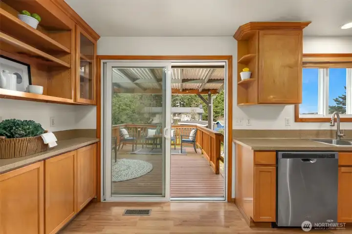 Slider to partially covered deck.