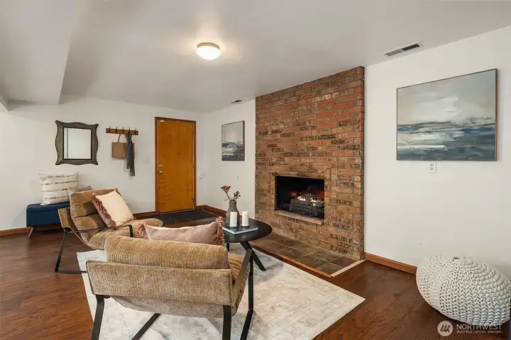 Wood burning fireplace downstairs.