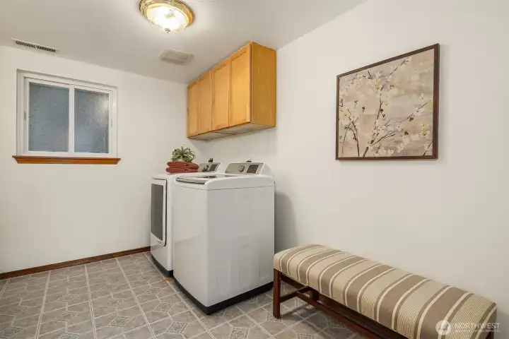 Laundry in downstairs 3/4 bathroom. Very roomy.