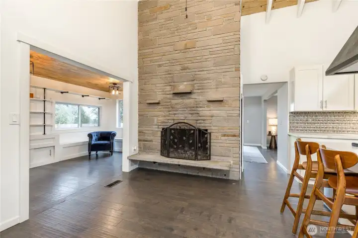 This floor-to-ceiling fireplace brings unrivaled character and scale to the home