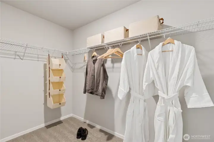 Primary walk-in closet.  Finishes and options will vary.