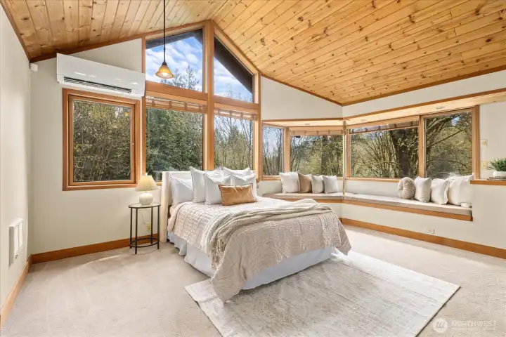 Primary with vaulted ceilings and wrap around bench seating