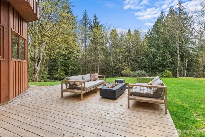 Deck off of living area to soak in the sunshine! No neighbors in sight