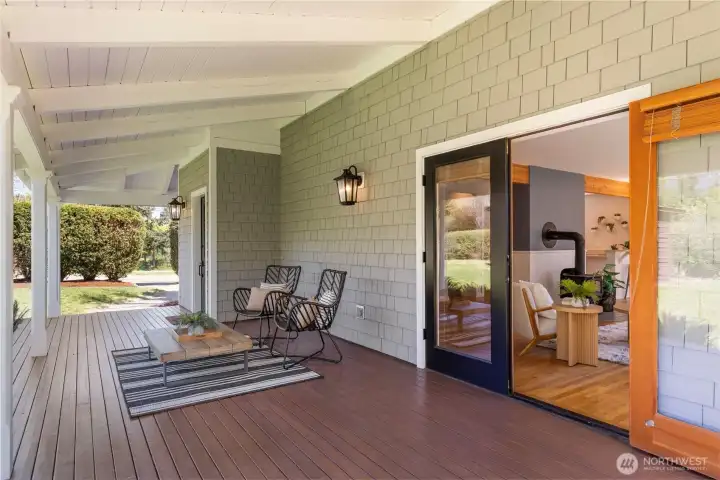 Welcomed by a beautiful large covered porch.