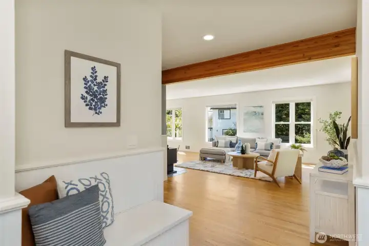 Sunlight great room with oak hardwood floors.