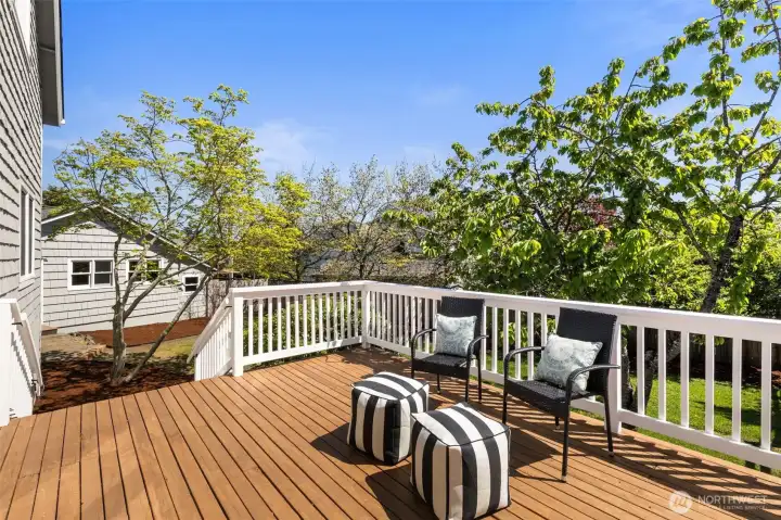 Radiant back patio in fenced yard area.