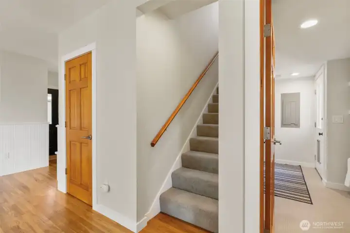 Upstairs to bedrooms and den.