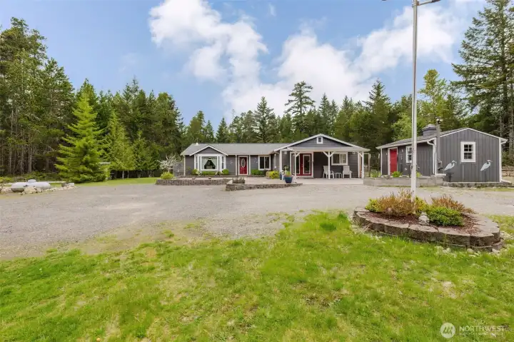 Foyer looking down the hall to the bedrooms.  Double doors lead to office.