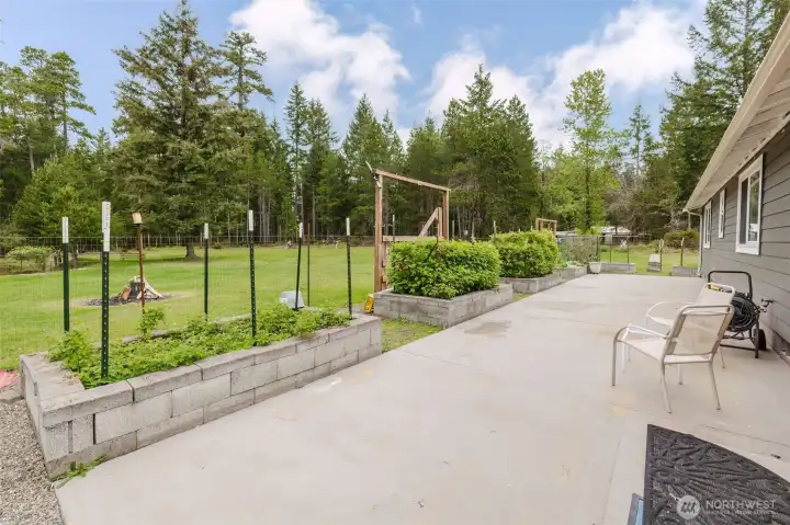 Raised garden beds behind deer fencing is a gardener's dream!