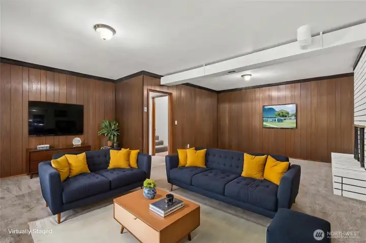 Lower level with wood burning fireplace and outdoor access Lower level with wood burning fireplace and outdoor access