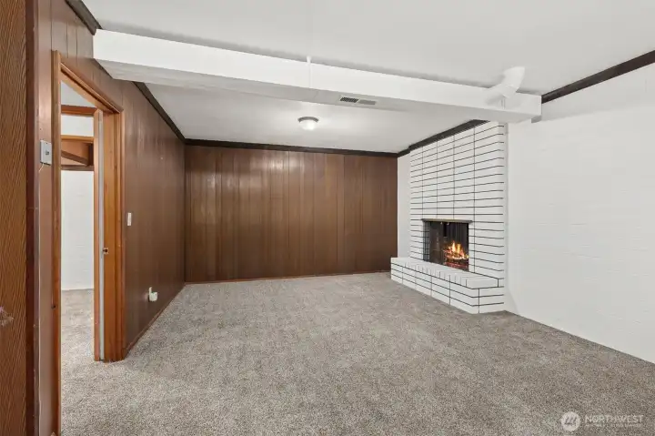 Lower level with wood burning fireplace