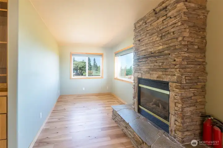 Fireplace and sitting area in the primary suite