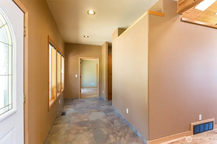 Main floor hallway to primary suite