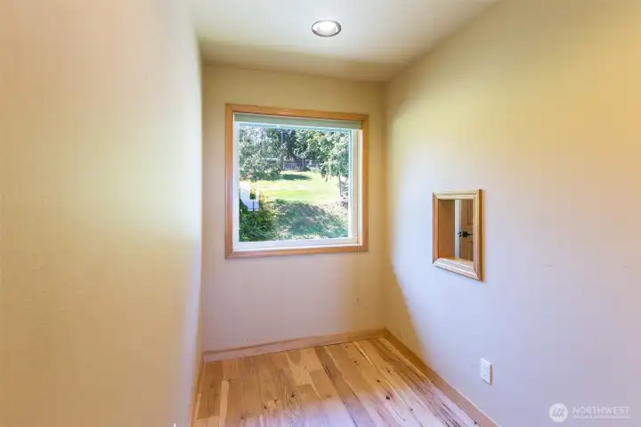 Alcove near guest bedrooms with pass-through to laundry
