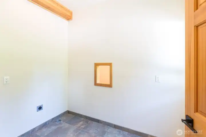 Laundry room with pass-through