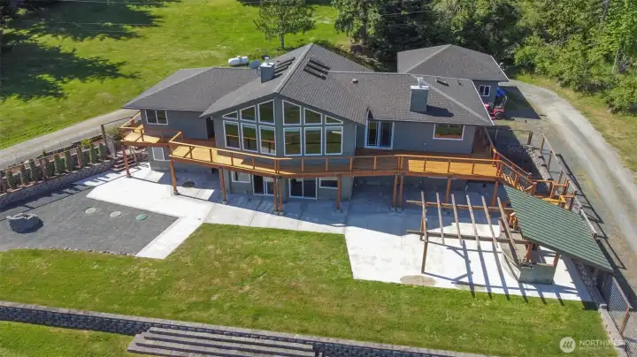 Lots of entertainment space on the deck and the patio with outdoor kitchen