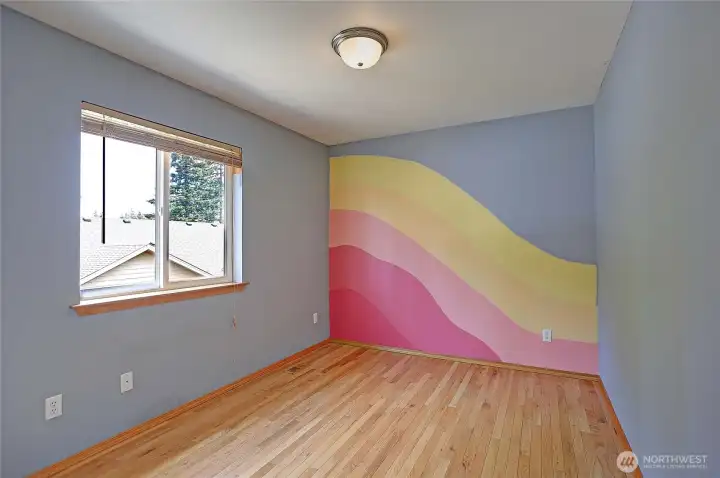 Well-sized bedroom with natural light and spacious closet.