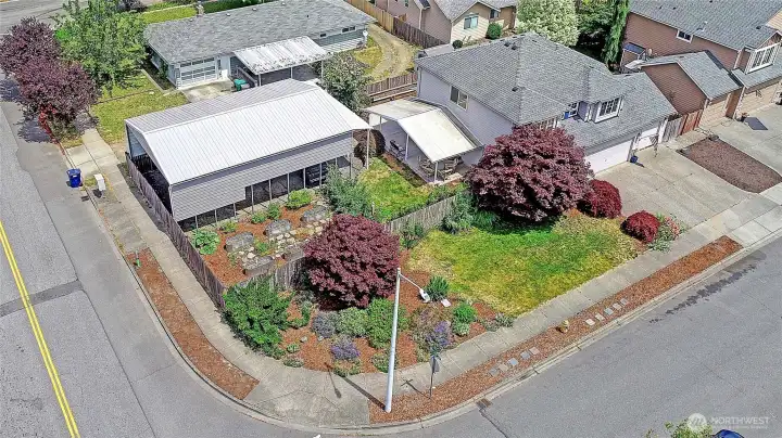 Aerial view highlighting the spacious lot, RV/boat storage, and private backyard.