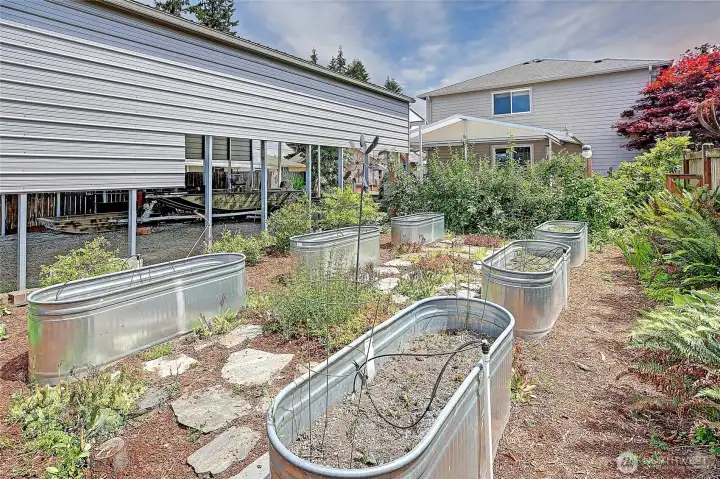 Raised garden beds provide the perfect space to grow your own vegetables, herbs, and flowers.