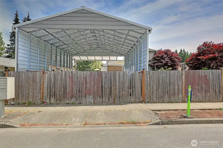20' gated access leads to an impressive 30' x 40' covered RV carport.
