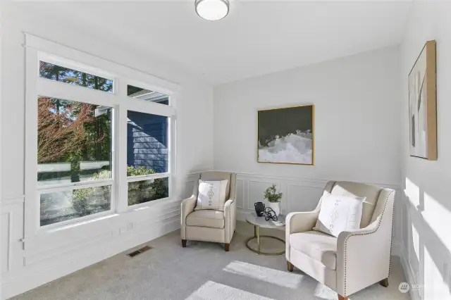 Sunny sitting room adjacent to the foyer