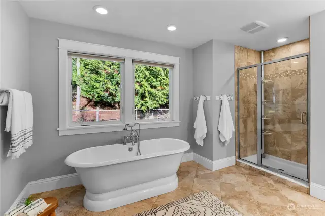 Full upstairs bathroom with free-standing soaking tub, walk-in shower...