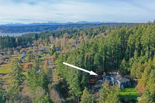 View from above looking west with the Olympic Mountains in the distance. Fabulous south-end location close to miles of trails and waterfront access plus all the amenities of Pleasant Beach Village/Lynwood Center.