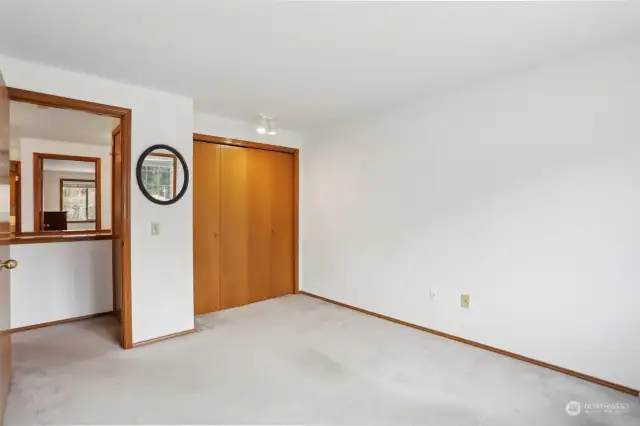 Upstairs Bedroom 1 has closet organizer shelves