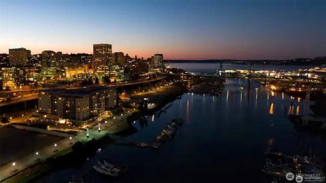 The Thea Foss Waterway at twilight, with The Esplanade shown on the left.