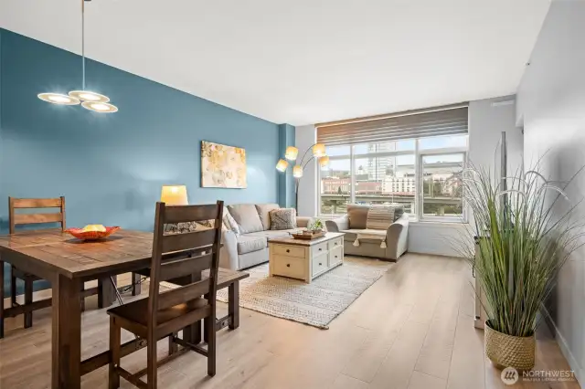 The wall-to-wall ceiling height window in your living room frames to ever changing city scenes.