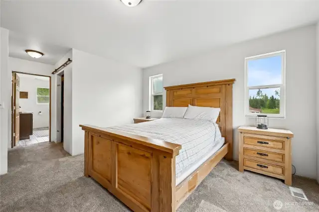 The primary suite includes a large walk-in closet and a private ensuite for ultimate comfort and convenience.