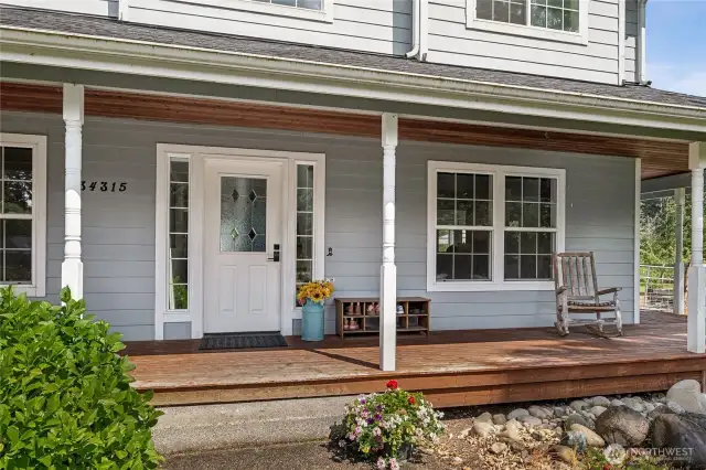 Classic country porch facing west—perfect for soaking in golden sunsets and peaceful evening breezes.