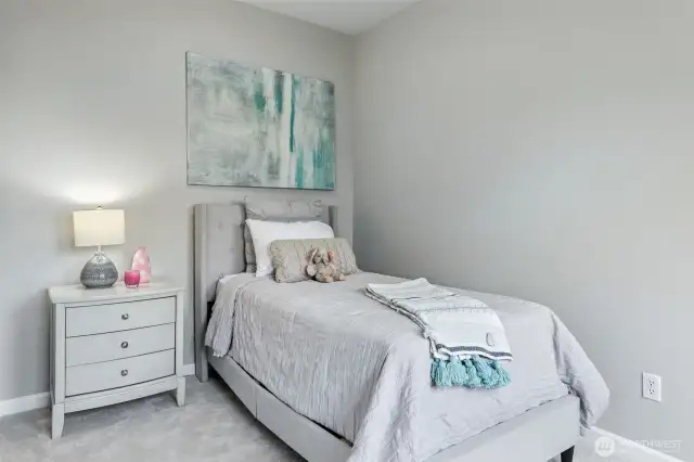 Third bedroom located on the top floor with new carpeting, and ample closet space.