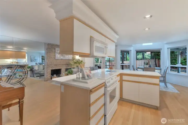 Hard wood floors throughout sitting room/kitchen area.