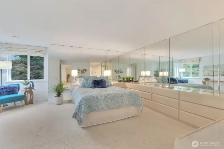 Primary bedroom suite with sitting area. Drawer units can stay.
