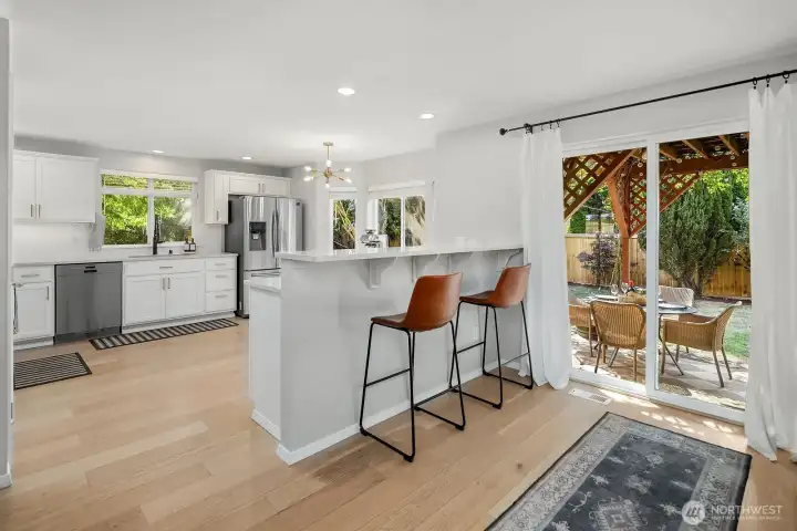 Sliding door out to the back yard.  More space for entertaining.