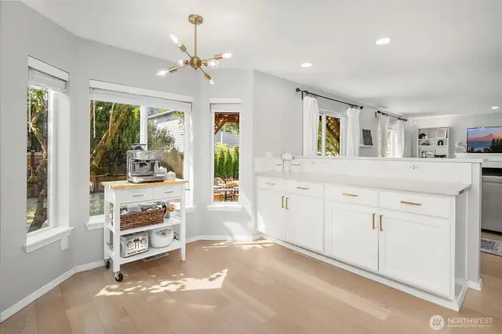 Kitchen can be an eat-in space, now used as a coffee bar at the bay window