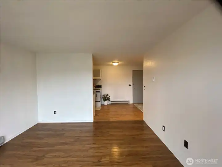 From the living room, looking to the kitchen/entry
