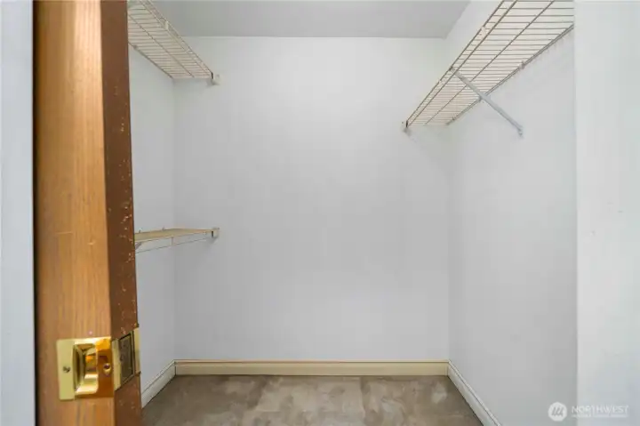 Primary walk-in closet.