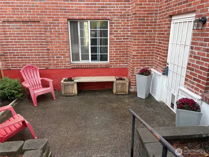 Private patio features large space w/raised beds is fenced & gated